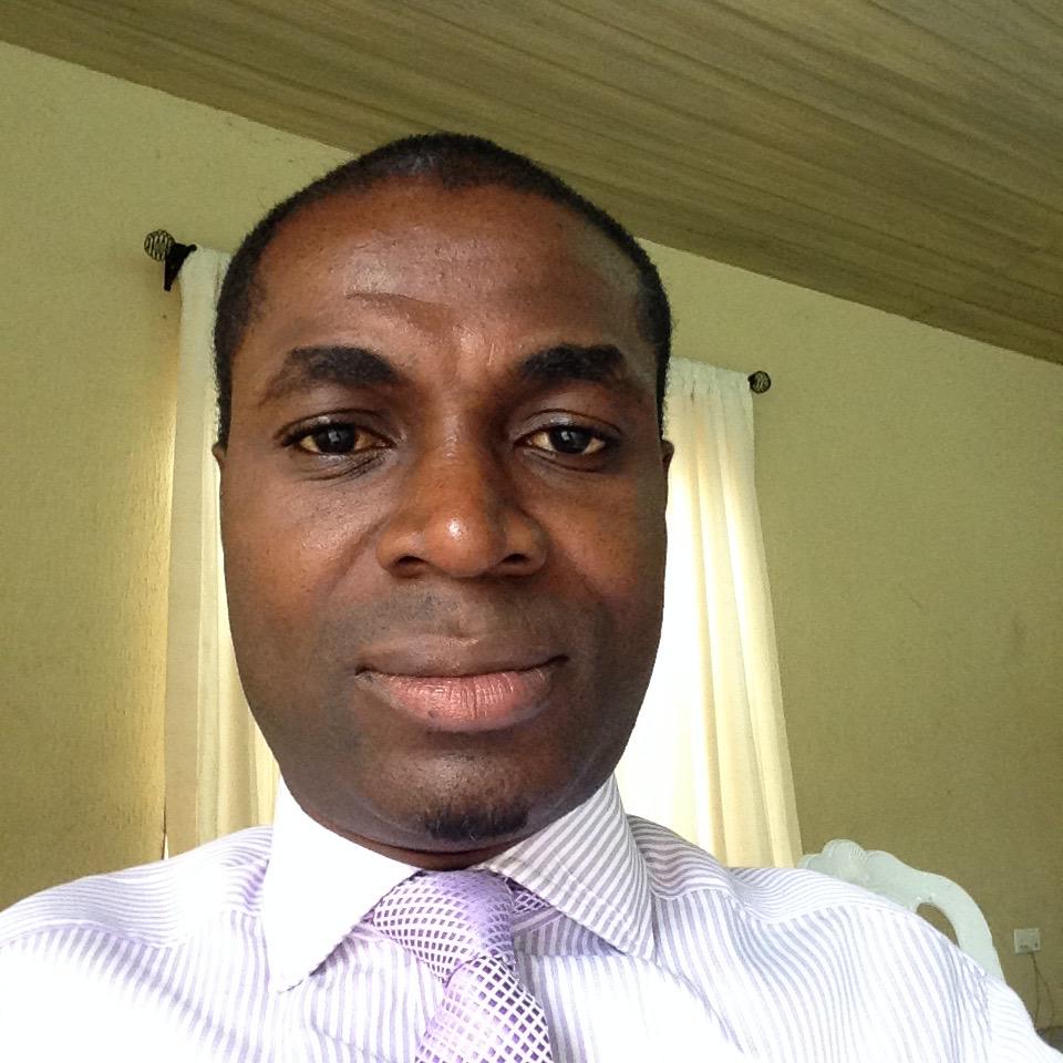 Portrait of Pastor Matthew (Tolu) Olowoyeye, Lead Pastor of Jesus Brand Fellowship, smiling.